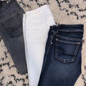 Grey distressed American eagle skinny jeans.